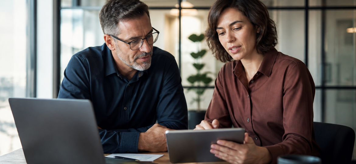 Small business owner and automation consultant reviewing AI workflow automation security before connecting company systems