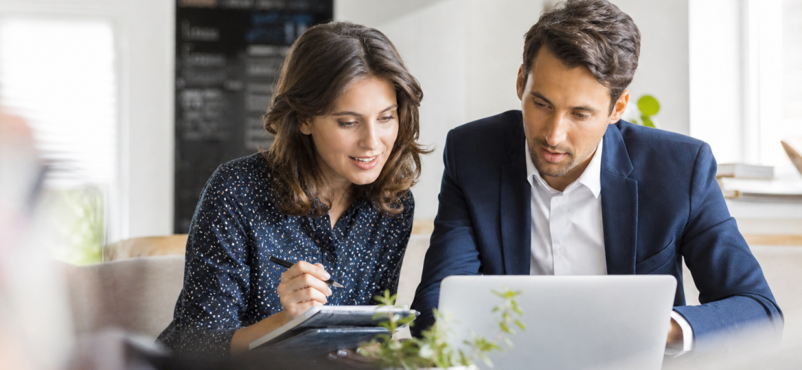Small business owner and consultant reviewing website content for AI search citation readiness