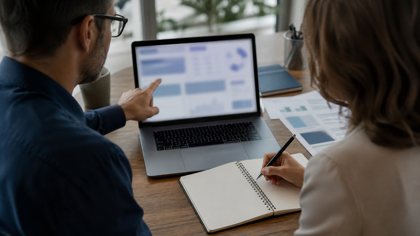 Business owner and consultant reviewing blurred AI search citation signals for FAQ answers